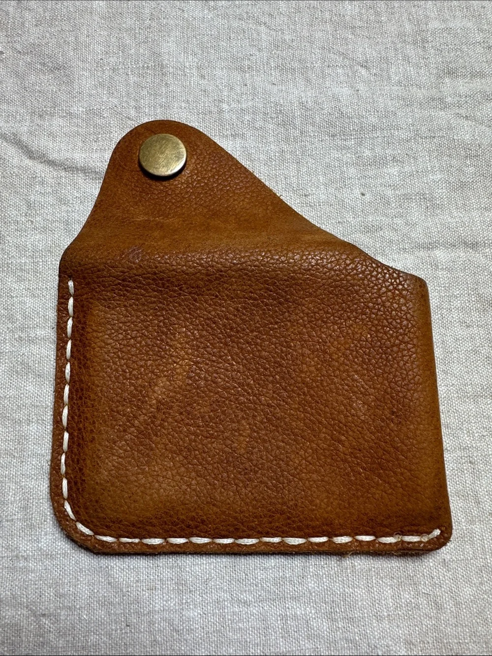 Leather card holder with metal snap. 4x3